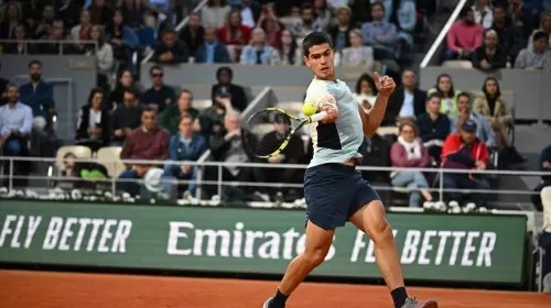 Alcaraz: Alcaraz reaches first Roland-Garros final with five-set win over Si...