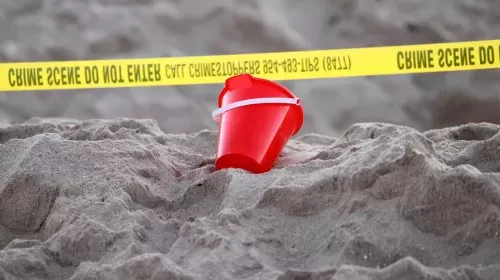 Young girl dies after being buried by sand while digging hole on beach
